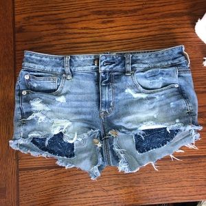 Low rise ripped jean shorts